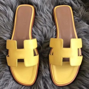Hermes Oran Sandals In Yellow Swift Leather