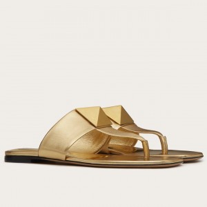 Valentino One Stud Flat Thong Sandals In Gold Metallic Leather