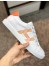 Hermes Avantage Sneakers In White/Orange Calfskin