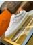 Hermes Quicker Sneakers In White/Orange Calfskin