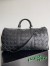 Bottega Veneta Medium Duffle Bag in Black Intrecciato Grained Calfskin