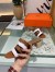 Hermes Amica 5mm Sandals In Brown/White Calfskin