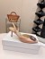 Manolo Blahnik Hangisi 70 Slingback Pumps in Champagne Satin