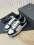 Saint Laurent Women's SL/61 Sneakers in Black and White Leather