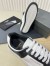 Saint Laurent Women's SL/61 Sneakers in Black and White Leather