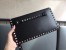 Valentino Medium Rockstud Clutch In Black Calfskin