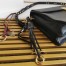 Prada Soft Sound Large Bag with Charms in Black Leather