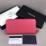 Prada Zipped Wallet In Pink Saffiano Leather