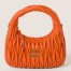Miu Miu Wander Hobo Bag in Orange Matelasse Leather